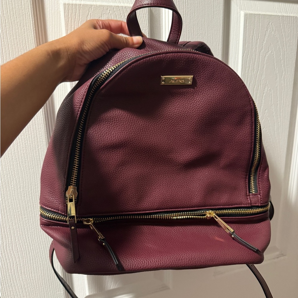 Aldo Burgundy Backpack with Gold Accents